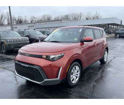 2023 Kia Soul LX is a Orange 2023 Kia Soul sport Car for Sale in Michigan City IN