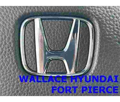 2023 Honda CR-V Hybrid Sport is a Silver, White 2023 Honda CR-V Hybrid in Fort Pierce FL