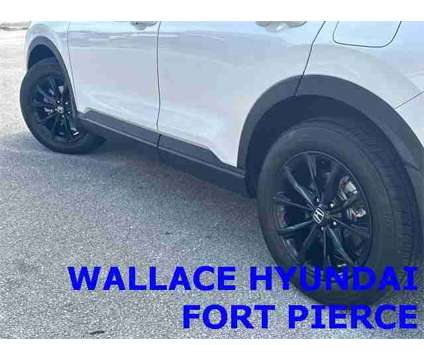 2023 Honda CR-V Hybrid Sport is a Silver, White 2023 Honda CR-V Hybrid in Fort Pierce FL