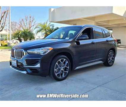 2021 BMW X1 xDrive28i is a Black 2021 BMW X1 xDrive 28i SUV in Riverside CA