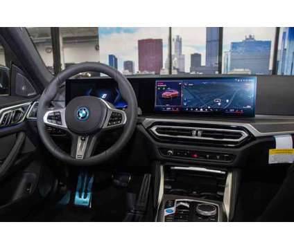 2024 BMW i4 xDrive40 is a Orange 2024 Sedan in Lake Bluff IL