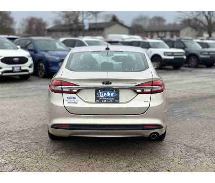 2017 Ford Fusion Energi SE Luxury is a Gold, White 2017 Ford Fusion Energi SE Luxury Sedan in Manteno IL