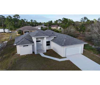 Beautiful, New Construction, Upgrades in Lehigh Acres FL is a Single-Family Home