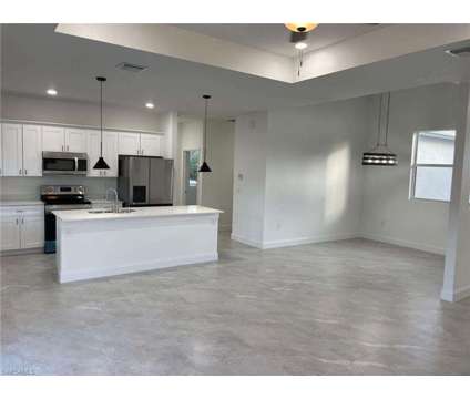 Beautiful, New Construction, Upgrades in Lehigh Acres FL is a Single-Family Home