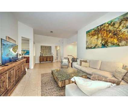 Sophistication, Tranquility, Exclusivity at 18910 Bay Woods Lake in Fort Myers FL is a Condo