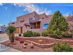 Impressive Pueblo Style Home-4 bedrooms (2 masters), office and mountain views!