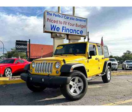 2015 Jeep Wrangler for sale is a Yellow 2015 Jeep Wrangler Car for Sale in Orlando FL