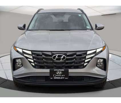 2024 Hyundai Tucson Hybrid Blue is a Silver 2024 Hyundai Tucson Hybrid in Greeley CO
