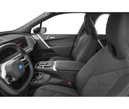 2025 BMW iX xDrive50 is a Grey 2025 BMW 325 Model iX SUV in Loveland CO