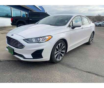 2019 Ford Fusion SE is a Silver, White 2019 Ford Fusion SE Sedan in Havre MT