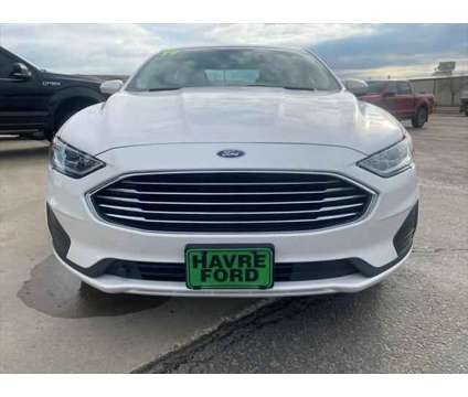 2019 Ford Fusion SE is a Silver, White 2019 Ford Fusion SE Sedan in Havre MT