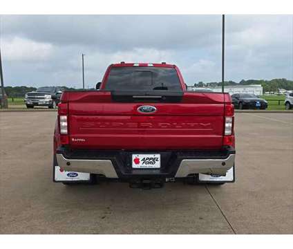 2022 Ford F-350 Lariat is a Red 2022 Ford F-350 Lariat Truck in Brenham TX