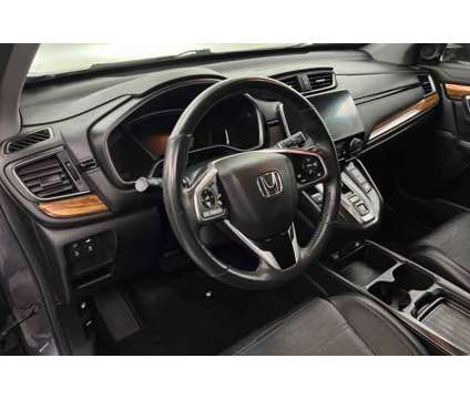 2020 Honda CR-V Hybrid EX-L is a Grey 2020 Honda CR-V Hybrid in Saint George UT
