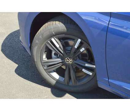 2024 Volkswagen Jetta 1.5T SE is a Blue 2024 Volkswagen Jetta 2.5 Trim Sedan in Highland Park IL