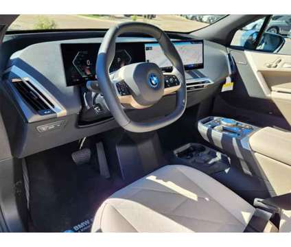 2025 BMW iX xDrive50 is a 2025 BMW 325 Model iX SUV in Loveland CO
