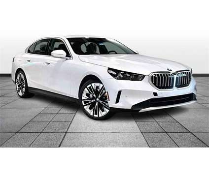 2024 BMW 5 Series i xDrive is a White 2024 BMW 5-Series Sedan in Grand Blanc MI