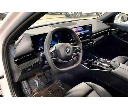 2024 BMW 5 Series i xDrive is a White 2024 BMW 5-Series Sedan in Grand Blanc MI