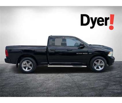 2012 Ram 1500 Sport is a Black 2012 RAM 1500 Model Sport Truck in Vero Beach FL