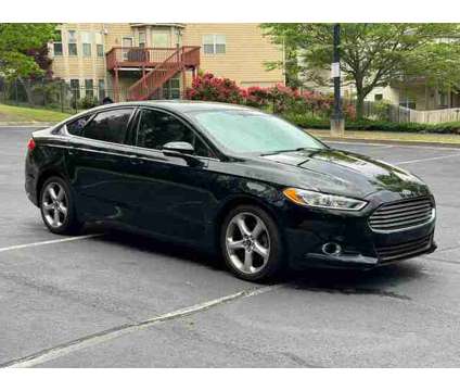 2016 Ford Fusion for sale is a Black 2016 Ford Fusion Car for Sale in Lilburn GA