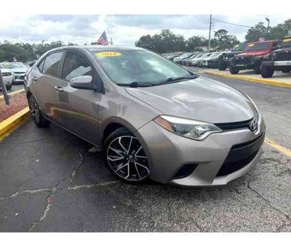 2014 Toyota Corolla for sale is a Brown 2014 Toyota Corolla Car for Sale in Orlando FL