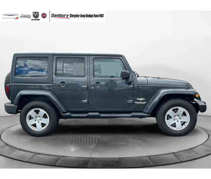 2010UsedJeepUsedWrangler UnlimitedUsed4WD 4dr is a Grey 2010 Jeep Wrangler Unlimited Car for Sale in Danbury CT