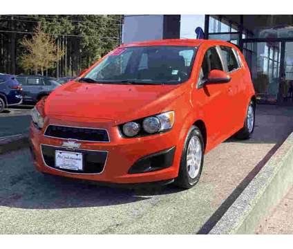 2013UsedChevroletUsedSonicUsed5dr HB is a Orange 2013 Chevrolet Sonic Car for Sale in Vancouver WA