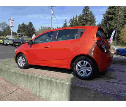 2013UsedChevroletUsedSonicUsed5dr HB is a Orange 2013 Chevrolet Sonic Car for Sale in Vancouver WA