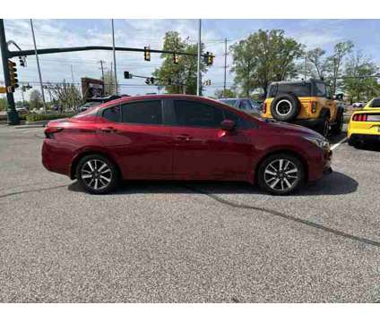 2021 Nissan Versa SV is a Red 2021 Nissan Versa 1.6 Trim Car for Sale in Collierville TN