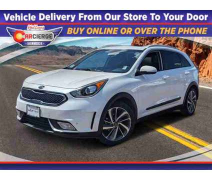 2017 Kia Niro Touring is a White 2017 Kia Niro Touring Car for Sale in Colorado Springs CO