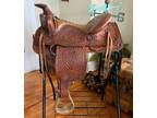 Western horse saddle - Brown leather tooled