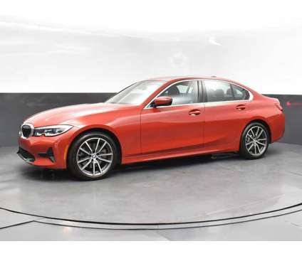 2021 BMW 3 Series 330i is a Red 2021 BMW 3-Series Sedan in Jackson MS