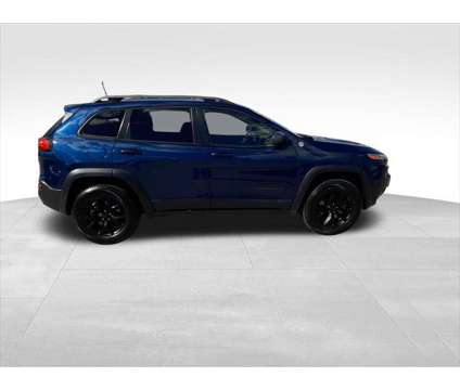 2018 Jeep Cherokee Trailhawk 4x4 is a Blue 2018 Jeep Cherokee Trailhawk SUV in Quincy IL
