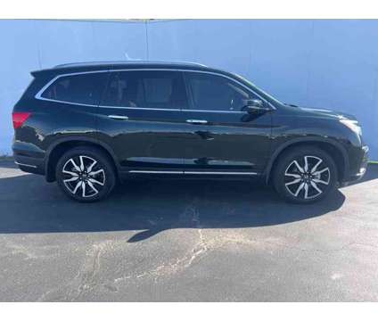 2020 Honda Pilot Elite is a Black 2020 Honda Pilot Elite SUV in Effingham IL