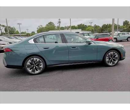 2024 BMW 5 Series i is a Green 2024 BMW 5-Series Sedan in Jacksonville FL