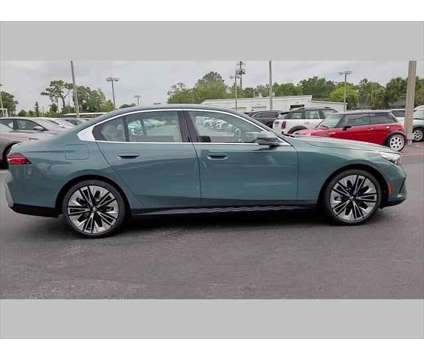 2024 BMW 5 Series i is a Green 2024 BMW 5-Series Sedan in Jacksonville FL