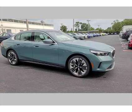 2024 BMW 5 Series i is a Green 2024 BMW 5-Series Sedan in Jacksonville FL