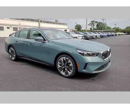 2024 BMW 5 Series i is a Green 2024 BMW 5-Series Sedan in Jacksonville FL