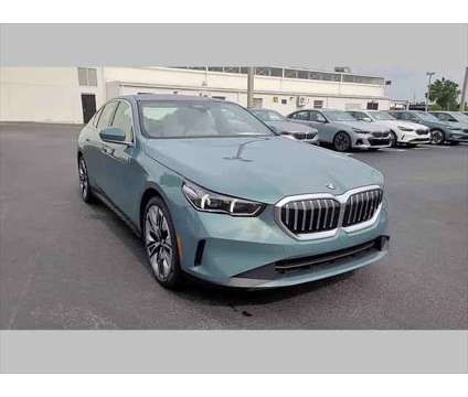 2024 BMW 5 Series i is a Green 2024 BMW 5-Series Sedan in Jacksonville FL