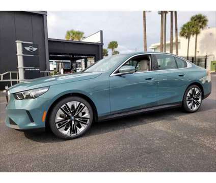 2024 BMW 5 Series i is a Green 2024 BMW 5-Series Sedan in Jacksonville FL