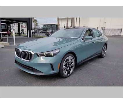 2024 BMW 5 Series i is a Green 2024 BMW 5-Series Sedan in Jacksonville FL