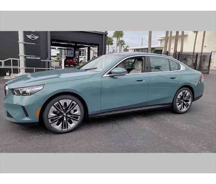 2024 BMW 5 Series i is a Green 2024 BMW 5-Series Sedan in Jacksonville FL