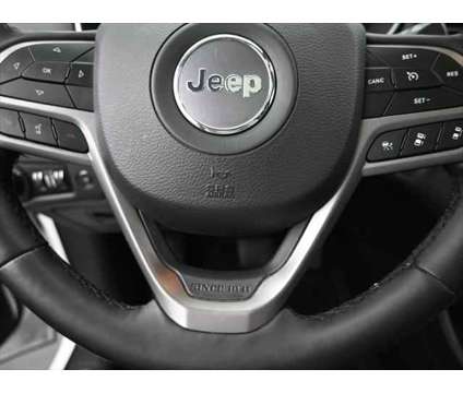 2021 Jeep Cherokee Limited 4X4 is a White 2021 Jeep Cherokee Limited SUV in Dubuque IA