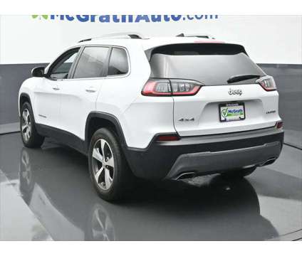 2021 Jeep Cherokee Limited 4X4 is a White 2021 Jeep Cherokee Limited SUV in Dubuque IA