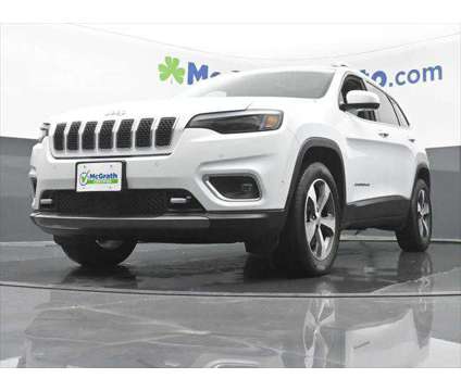 2021 Jeep Cherokee Limited 4X4 is a White 2021 Jeep Cherokee Limited SUV in Dubuque IA