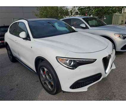 2023 Alfa Romeo Stelvio Ti is a White 2023 Alfa Romeo Stelvio Ti SUV in Pinellas Park FL