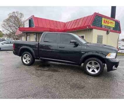 2011 Ram 1500 Crew Cab for sale is a Black 2011 RAM 1500 Model Car for Sale in Akron OH