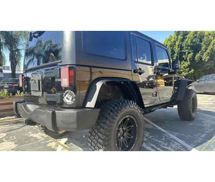 2012 Jeep Wrangler for sale is a Black 2012 Jeep Wrangler Car for Sale in Van Nuys CA