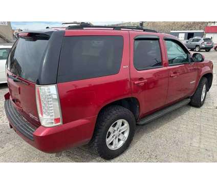 2013 GMC Yukon for sale is a Red 2013 GMC Yukon 1500 2dr Car for Sale in Billings MT