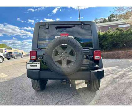 2013 Jeep Wrangler for sale is a Black 2013 Jeep Wrangler Car for Sale in Duluth GA