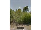 1/2 acre vacant land zoned for residential use in desirable Port Charlotte